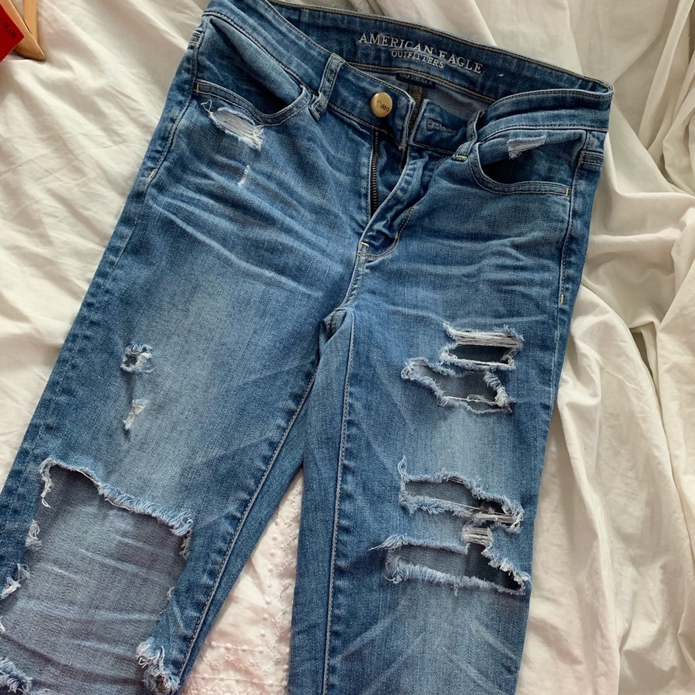 Light blue super stretch ripped skinny jeans.